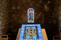 With stain-glass icon of St Patrick